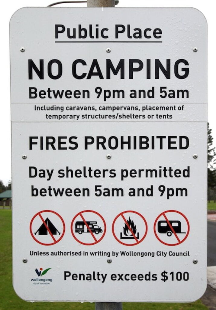 Free camp legally. No camping sign.